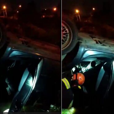 carro-capota-em-corrego-e-motorista-sai-ileso-no-litoral-de-sp;-video